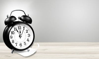 Retro alarm clock on table