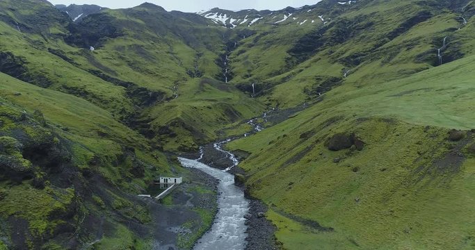 Smooth aerial tracking shot of exoctic canyon in Iceland