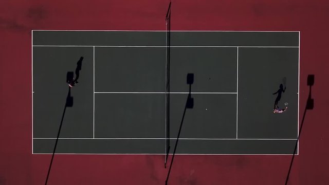 Drone shot of people playing tennis
