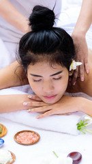 Obraz na płótnie Canvas Portrait of beautiful asian people with close up view and close up eyes and having hand massage in spa salon. Beauty, healthy, spa and relaxation concept.