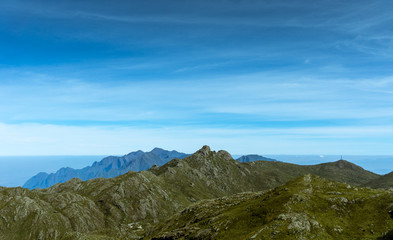 Beautiful blue sky with the landscape of a beautiful set of mountains of nature preserved in Brazil