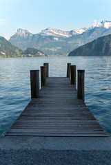 Pier in a lake in the Swiss Alps