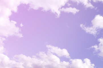 The blue sky with a lot of white clouds of different sizes, form