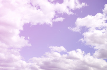 The blue sky with a lot of white clouds of different sizes, form