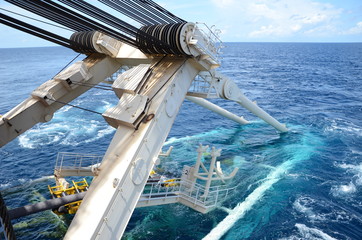 Pipe lay stinger is attached to the stern of pipe lay vessel during offshore pipeline installation.