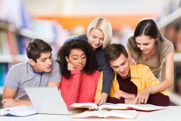 Four Young students studying subject on background