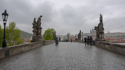 City of Prague and Charles Bridge on a cloudy day