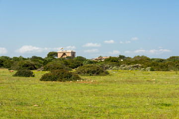 View of the old defense tower of Punta de N'Amer from the time of the Spanish civil war at Sa Coma, on the Spanish Mediterranean island Mallorca