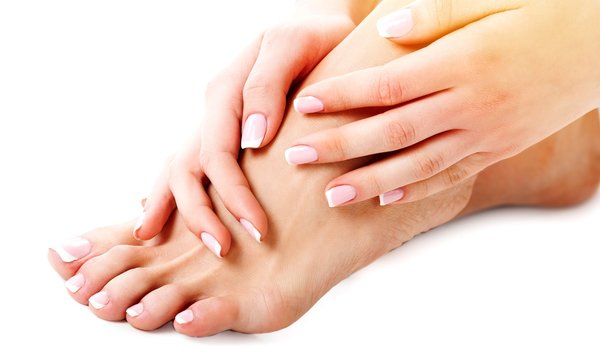 Perfect hands on female feet