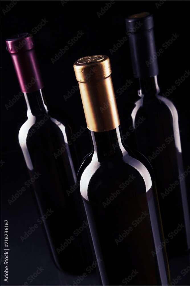 Canvas Prints Dark wine bottles in row