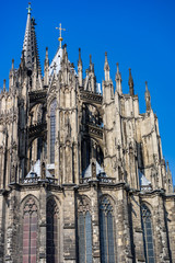 Fototapeta premium Cologne Cathedral with blue sky background, world herritage gothic cathedral, germany