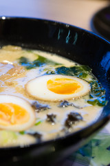 delicious japan food style menu.traditional japanese local Ramen noodle on black dish.japanese chef cooking Ramen noodles at japanese restaurant.tasty japanese food served on dish.