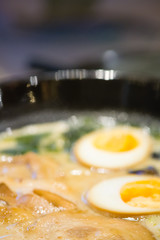 delicious japan food style menu.traditional japanese local Ramen noodle on black dish.japanese chef cooking Ramen noodles at japanese restaurant.tasty japanese food served on dish.
