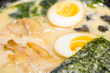 delicious japan food style menu.traditional japanese local Ramen noodle on black dish.japanese chef cooking Ramen noodles at japanese restaurant.tasty japanese food served on dish.