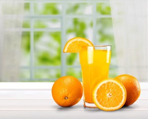 Orange juice and slices of orange © BillionPhotos.com