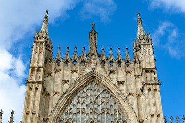 Fototapeta na wymiar Elaborate tracery on exterior building of York Minster, the historic cathedral built in English gothic architectural style located in City of York, England, UK