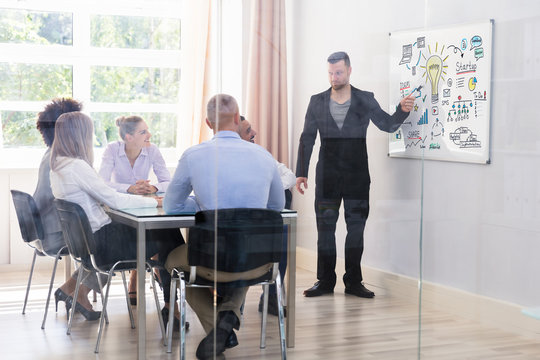 Businessman Giving Digital Marketing Presentation