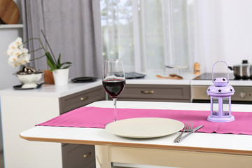 Stylish table in modern kitchen