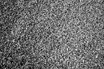 Ground stone grey background of many small stones, To use the article as a background.