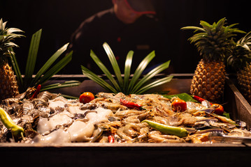Seafood buffet dinner on ice bar.