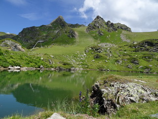 The Grunwaldsee in Obertauern near Hochalm and Seekarspitze. Austria