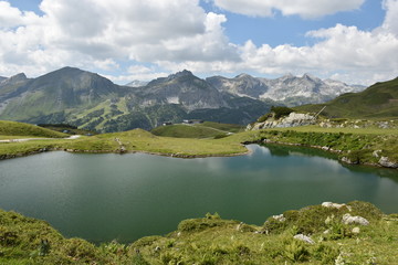 Fototapeta na wymiar The Grunwaldsee in Obertauern near Hochalm and Seekarspitze. Austria