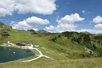 Fototapeta na wymiar The Grunwaldsee in Obertauern. Hochalm and Seekarspitze. Austria