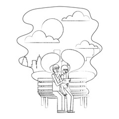 couple sitting on bench making selfie in the city