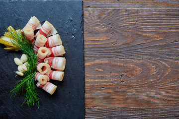 Set of lard with garlic, pepper and green onions..Russian and Ukrainian cuisine. On a wooden table....