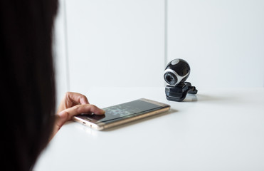 Hand holding and press mobile connect security camera,Phone watch CCTV