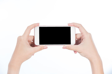 Concept of woman's hand holding a smartphone isolated on white background, clipping path, blank for webpage or message.