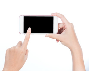 Concept of woman's hand holding a smartphone and pointing with figer isolated on white background, clipping path, blank for webpage or message.
