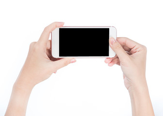 Concept of woman's hand holding a smartphone isolated on white background, clipping path, blank for webpage or message.