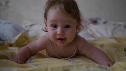 When the little suckling baby girl teething and drooling