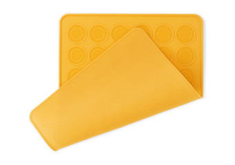 A color silicone muffin molds on a white background