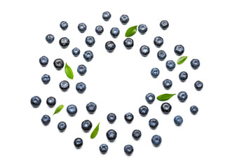Frame made of ripe blueberries on white background