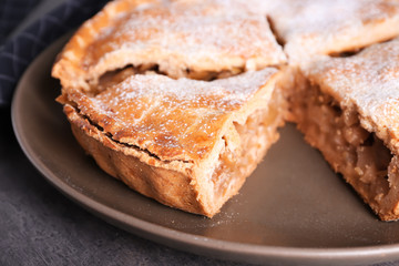 Delicious apple pie on plate, closeup
