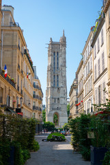 Fototapeta premium Paris typical street and Saint-Jacques flamboyant gothic tower