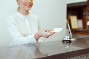 receptionist giving key