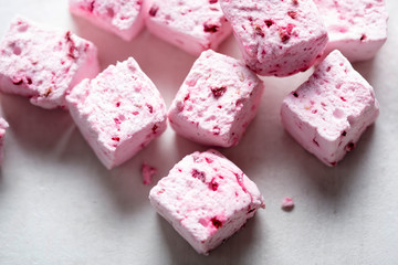 Marshmallows with cherries and raspberries