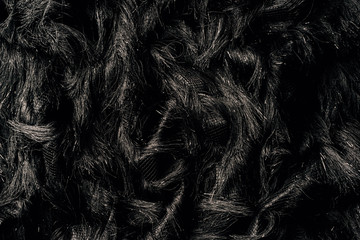 top view of furry black textile as background