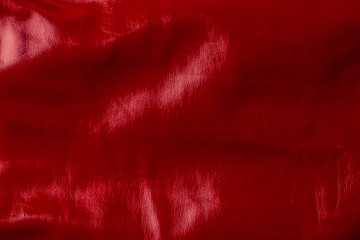 top view of red shiny textile as background