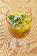 Delicious dessert in a glass cup close up top view