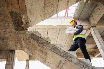 professional engineer worker at the house building construction site