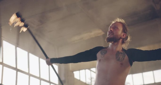 Male Performer Performing Fire Show In Abandoned Building Attraction Stunt Artist Fog Slow Motion 8k Red Epic