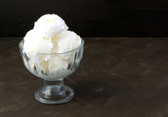 Ice cream balls in a glass vase.