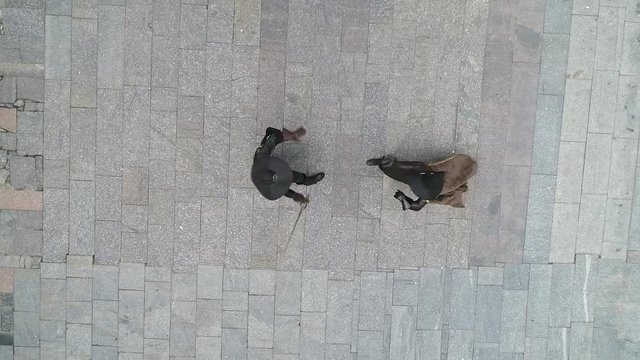 Aerial view of two men fighting in a duel