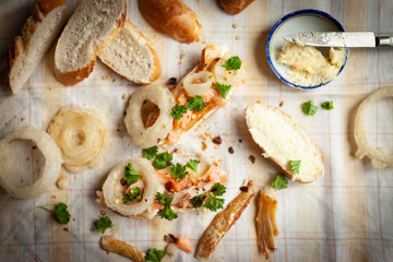 Smoked fish sandwich with onion rings