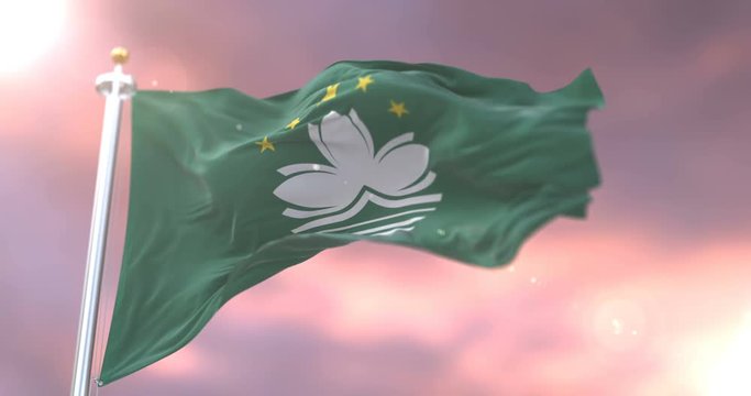 Flag of Macau waving at wind at sunset in slow, loop