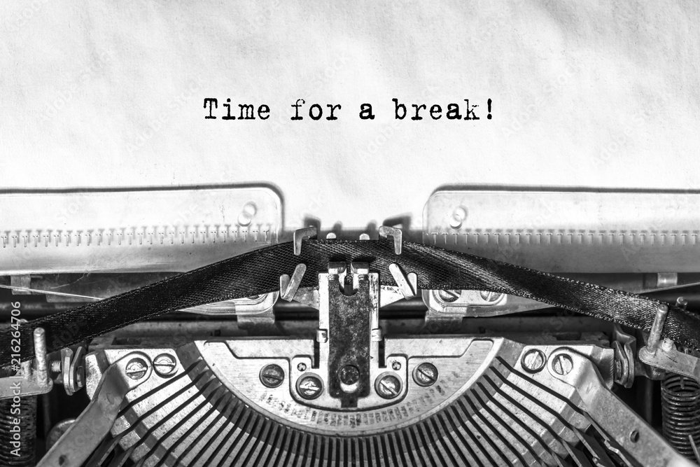 Fototapete time for a break, typed text on an old typewriter, close-up, ink on paper